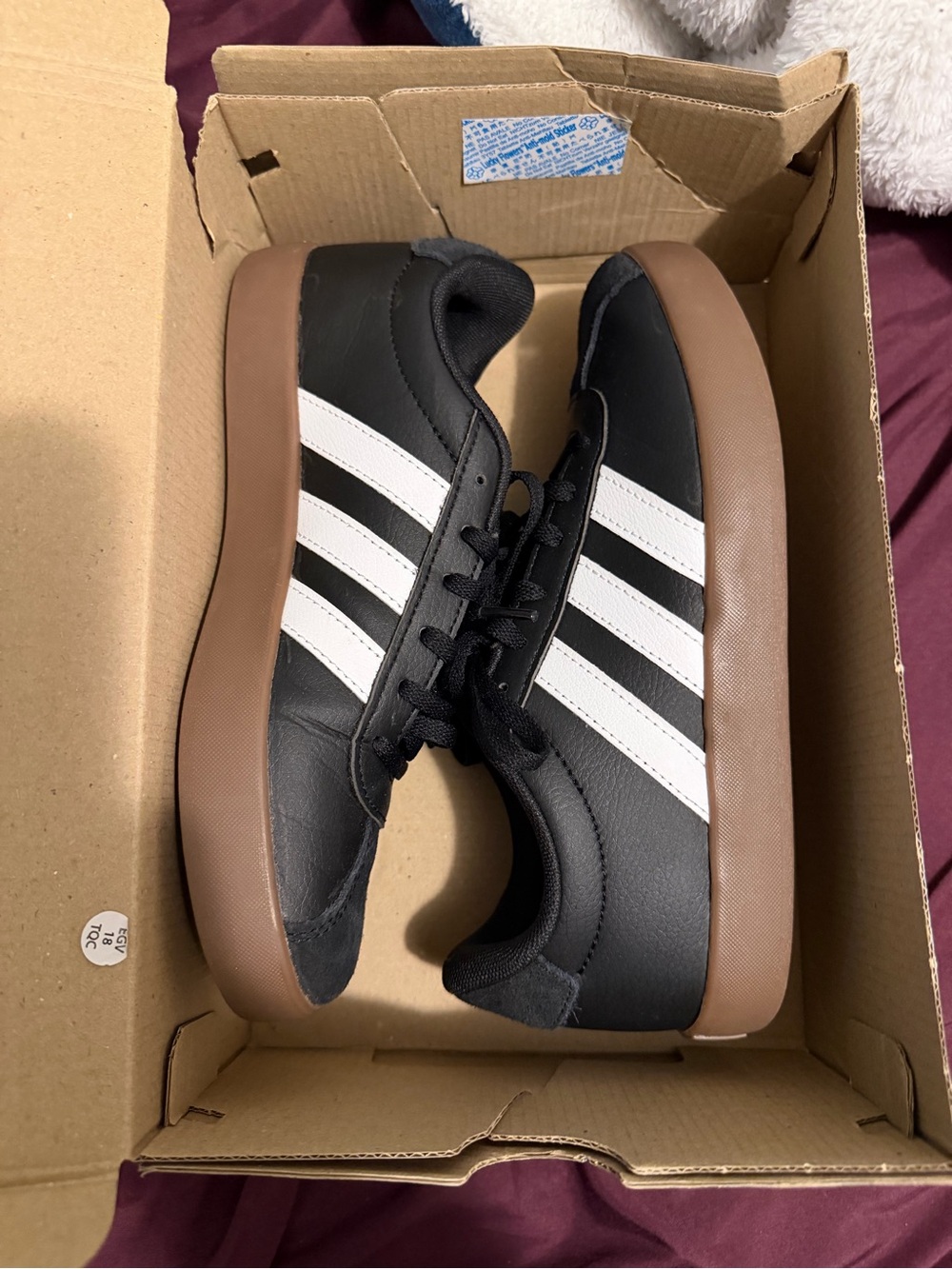 adidas Black Low-Top Sneakers with White Stripes and Gum Sole